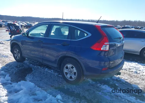 2015 Honda Cr-V Lx z USA, uszkodzony, nr VIN 5J6RM4H39FL109561